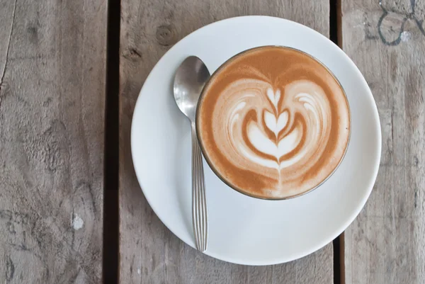 Copa de arte latte en madera — Foto de Stock