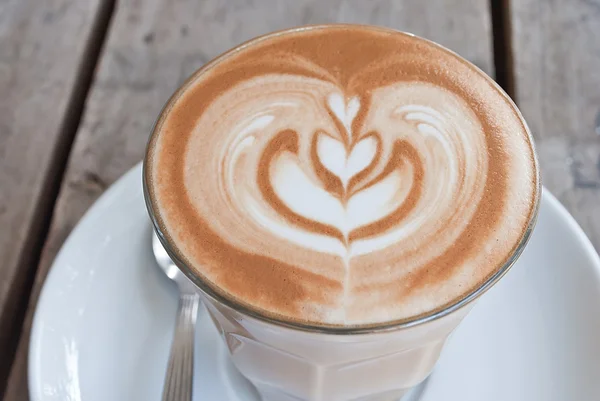 Copa de arte latte en madera — Foto de Stock