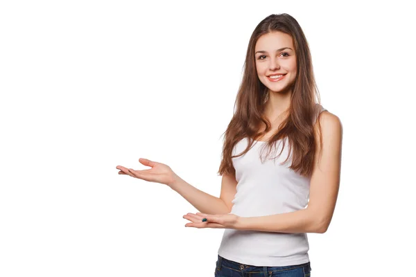 Smiling woman showing open hand palm with copy space for product or text — Stock Photo, Image