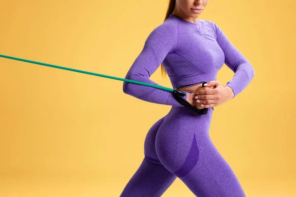 Athletic Girl Working Out Resistance Band Orange Background Fitness Woman — Foto de Stock