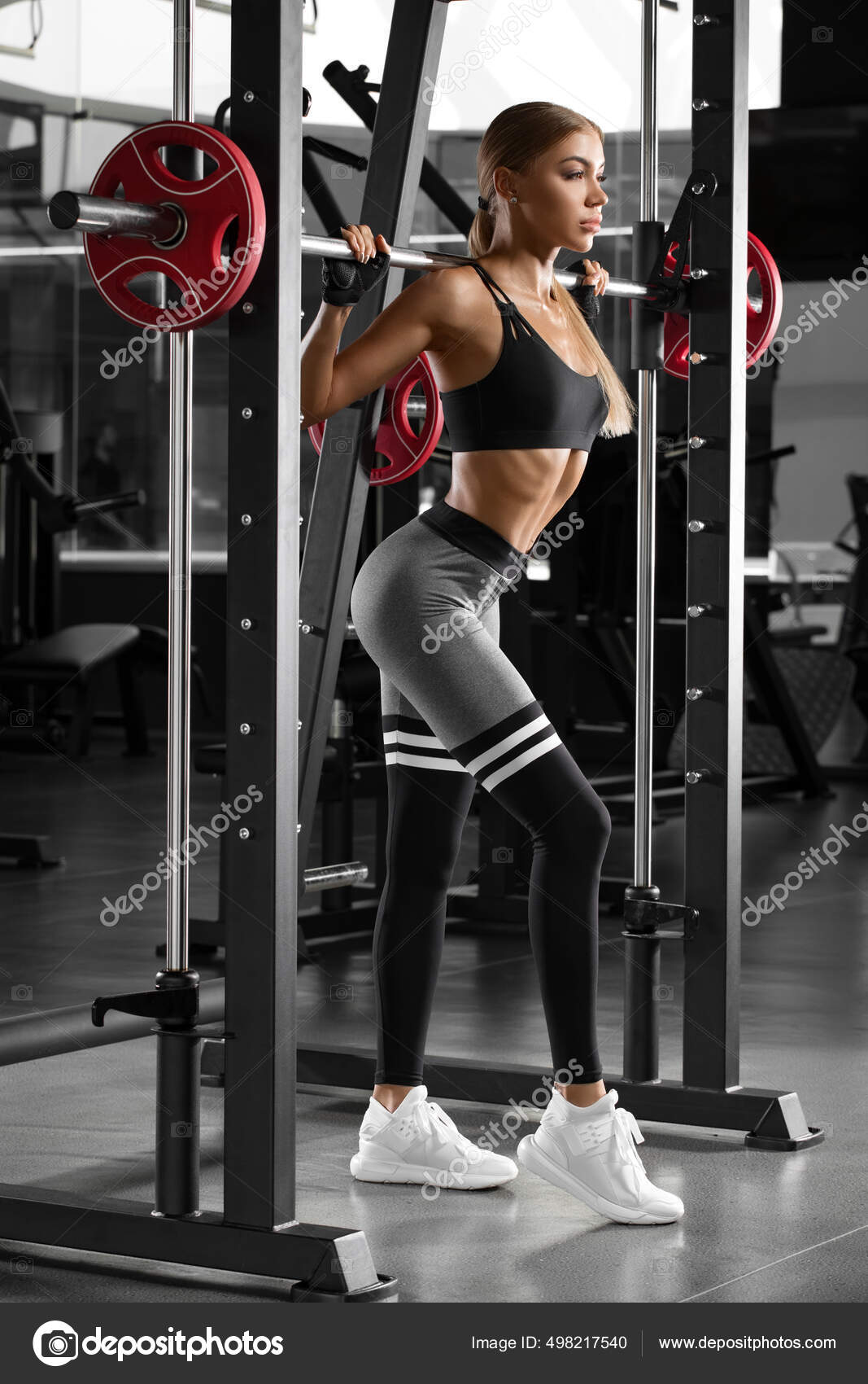 Athletic Girl Workout in Gym. Fitness Woman Doing Exercise for