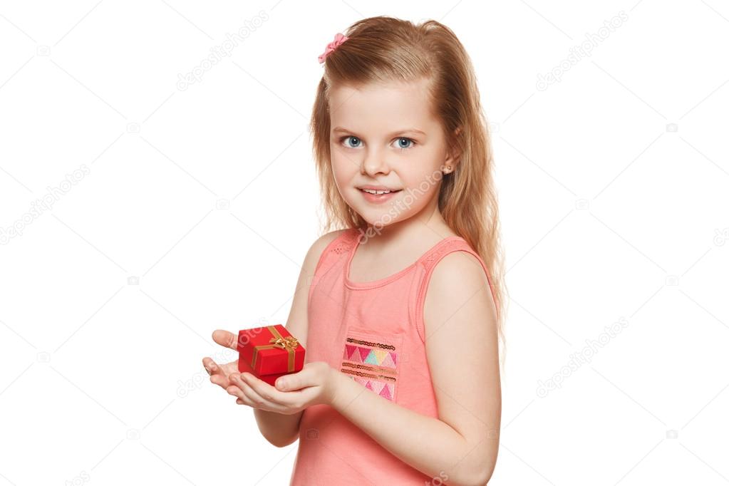 Little  girl holding  gift box