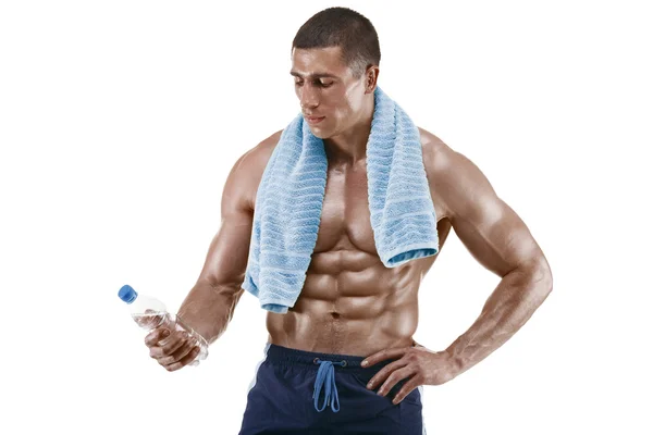 Muscular man with bottle of water. — Stock Photo, Image