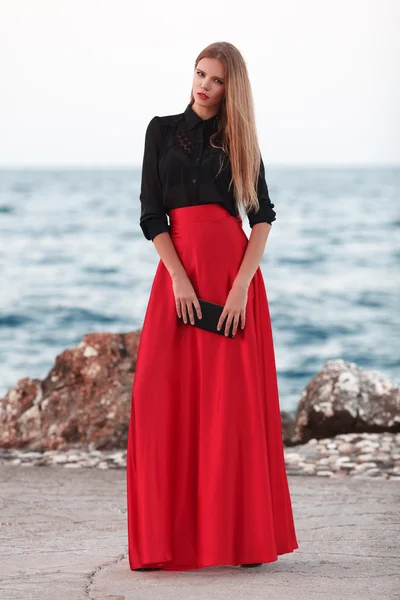 Sexy young woman in red dress — Stock Photo, Image