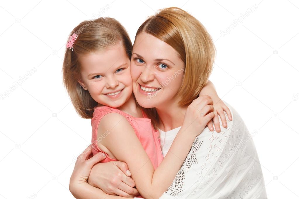 Happy mother and daughter hugging, isolated on white background