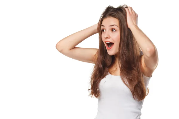 Surpreendido mulher bonita feliz olhando para os lados em emoção. Isolado sobre fundo branco — Fotografia de Stock