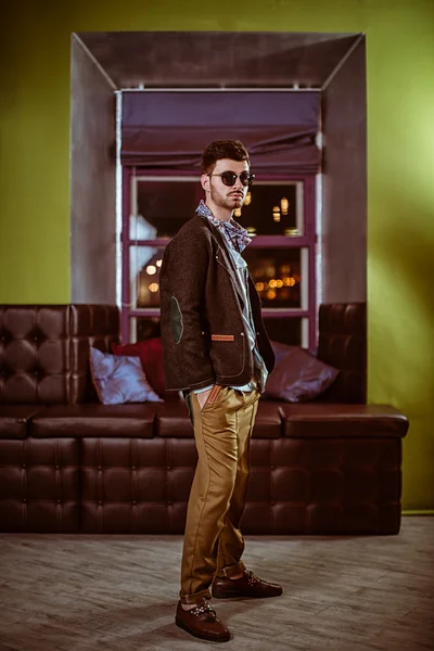 Young stylish sexy handsome model man in casual cloth lifestyle in glasses