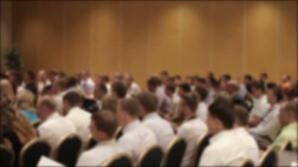 Many people came together at a conference or seminar. Blurred background for title. — Stock Video