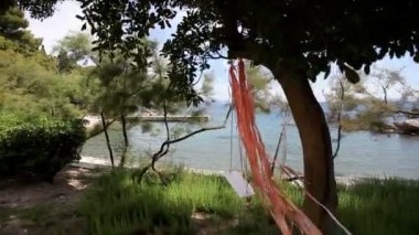 Çocuk salıncaklar Adriyatik Denizi beach oteller. Çekim sinek