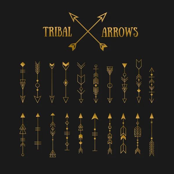 Set of gold hipster tribal arrows on chalkboard background — Stockvector