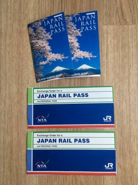 TOKYO, JAPAN - APRIL 3, 2018: JR tickets Japan Rail Pass. Japanese high speed Shinkansen trains are always available at convenient times. clipart