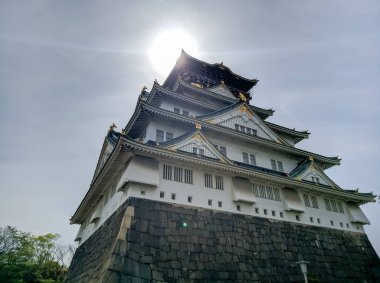 OSAKA, JAPAN - APRIL 4, 2018: Osakajo Great White Castle in Osaka, Japan. Construction of Osaka Castle, osakajo began in 1583 on the site of the former Ishiyama Hongan-ji Temple.
