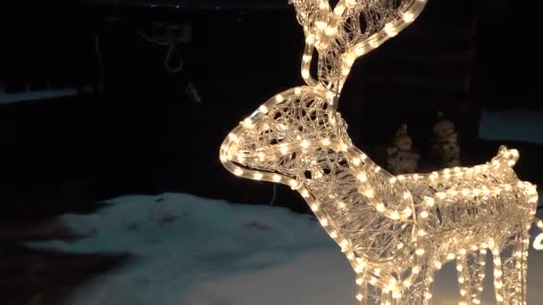 Christmas decoration for new year the deer with sleigh made from led garland — Stock Video