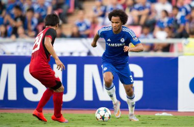 Isaiah Brown (blue) of Chelsea in action