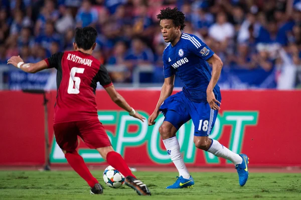 Loic Remy (blue) of Chelsea in action