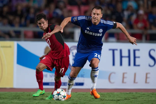 John Terry (blue) of Chelsea in action