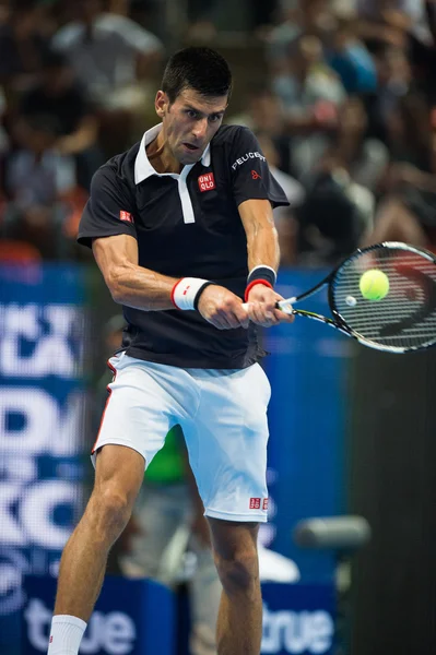 Novak Djokovic en el partido de tenis exposición — Foto de Stock