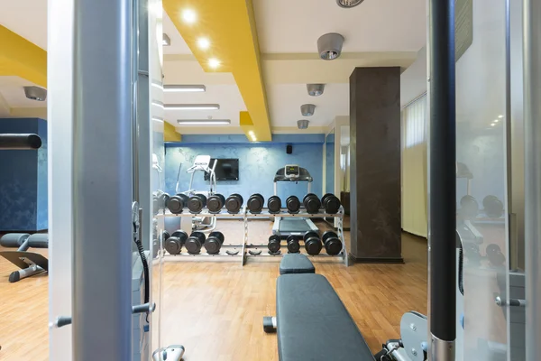 Hotel gym interior with equipment — Stock Photo, Image