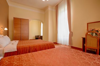 Masterbed bir otel yatak odası iç