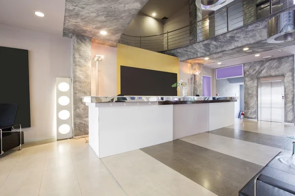 Modern building lobby with reception desk