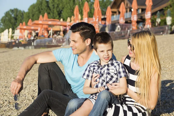 Family enjoying their time at the beach