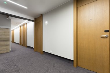 Corridor in a modern building clipart