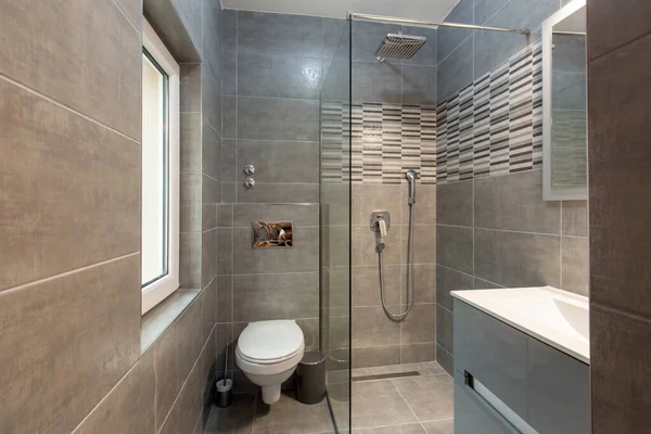 Interior of a hotel bathroom with shower cabin