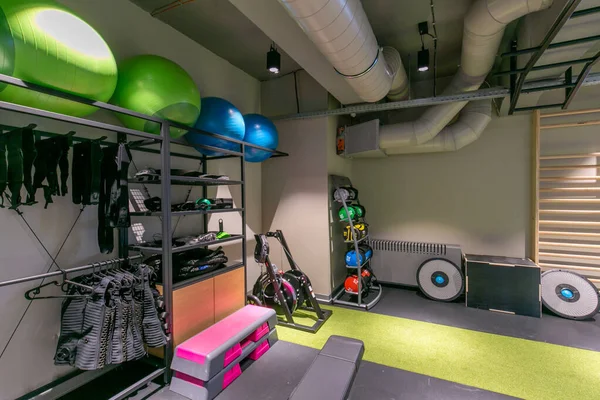 Interior of a modern hotel gym with equipment