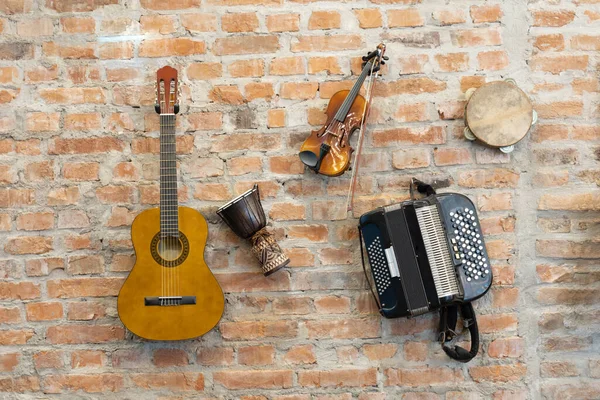 Old Instruments Hanging Brick Wall Decoration — Stock Photo, Image