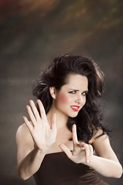 Pretty woman gesturing no with her hands — Stock Photo, Image