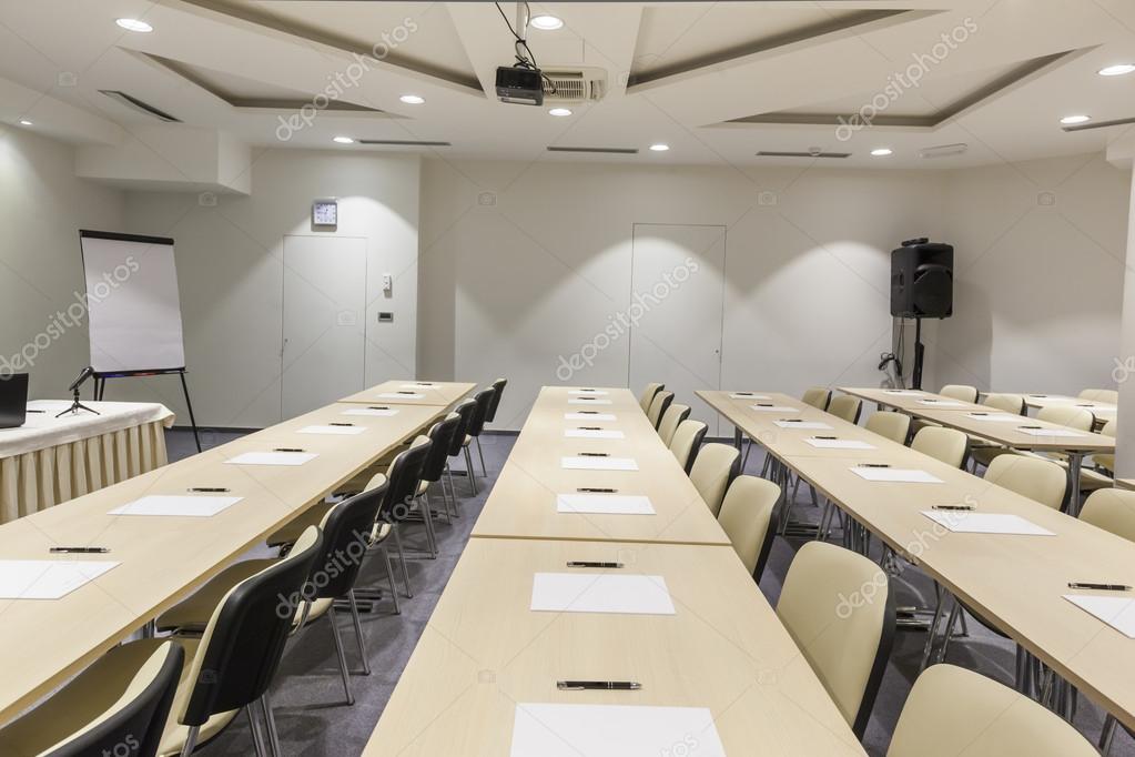 Desks In Rows With Blank Papers And Pens Stock Photo C Rilueda