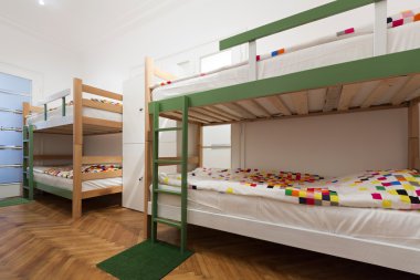 Bunk beds in a hostel room clipart