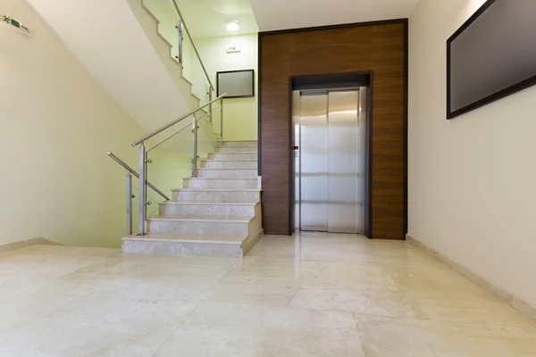 Elevator and stairs in modern building — Stock Photo, Image