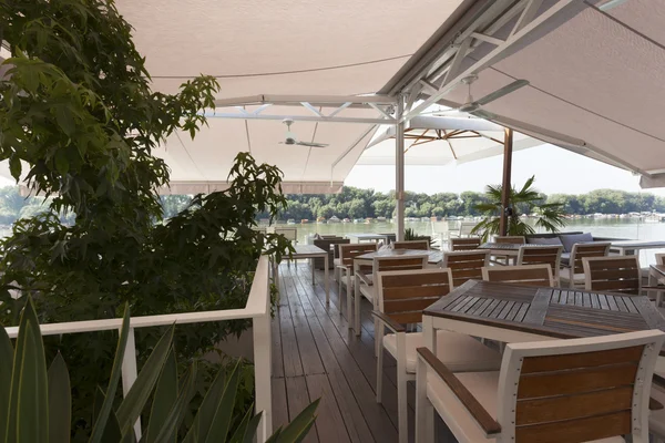 Riverside cafe terrace — Stock Photo, Image