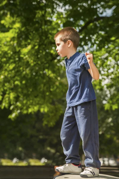 Boy playing outside — Stock Photo, Image