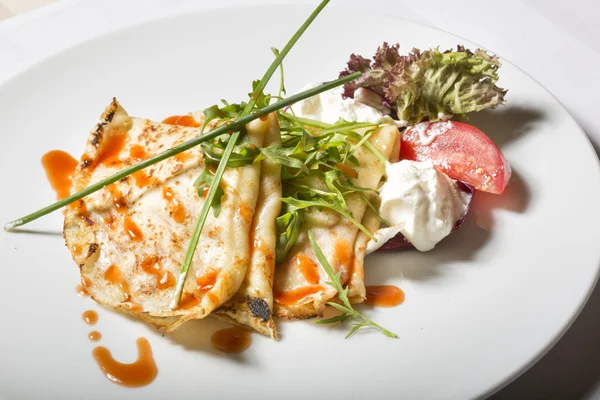 Savory crepes with tomato and cream — Stok fotoğraf