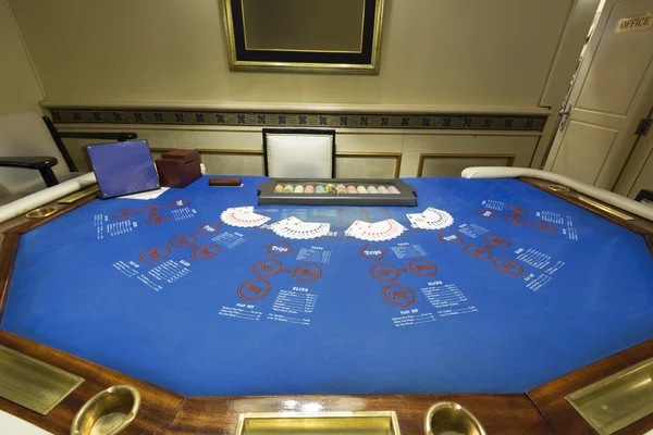 Ultimate Texas Hold 'em table at casino — стоковое фото