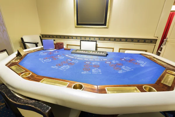 Ultimate texas hold 'em poker table at casino — Stock Photo, Image