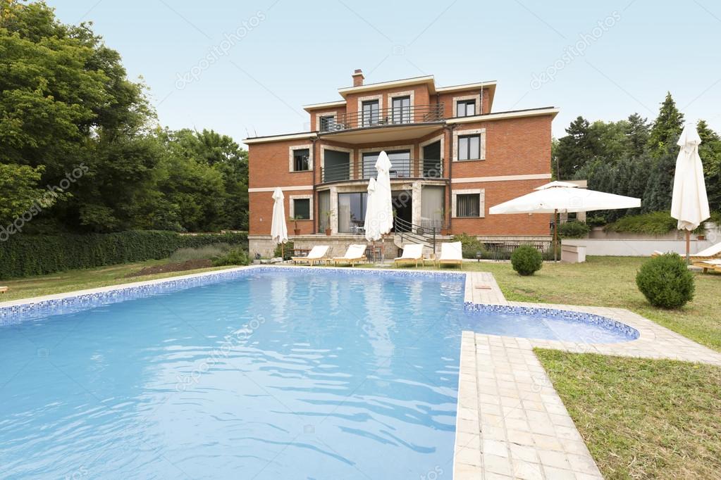 Private pool in front of a holiday resort