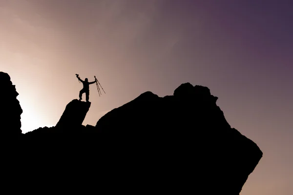 Outstanding photographer at the summit in the rocky mountains — Stock Photo, Image