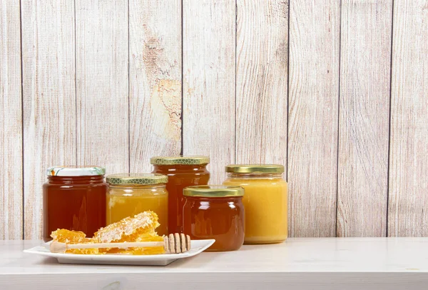 Various Honey Jars Different Color Honey Lot Copy Space Light — Stock Photo, Image