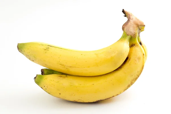 Gäng bananer på vit bakgrund — Stockfoto