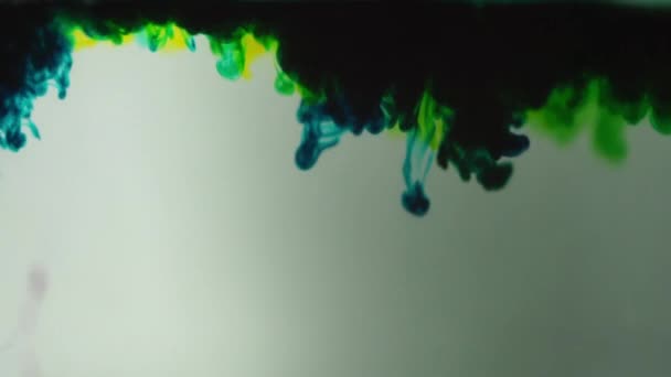 Blur waving  Blue and yellow color dye ink water drop in water slow motion — Stock Video