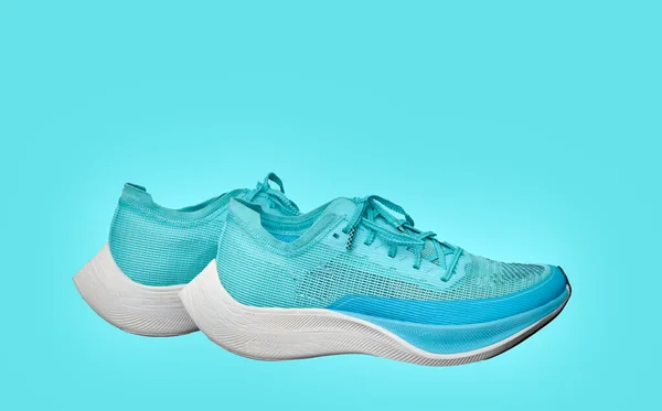 Teal Aqua Running Shoes Isolated Blue Background Side View — Fotografia de Stock