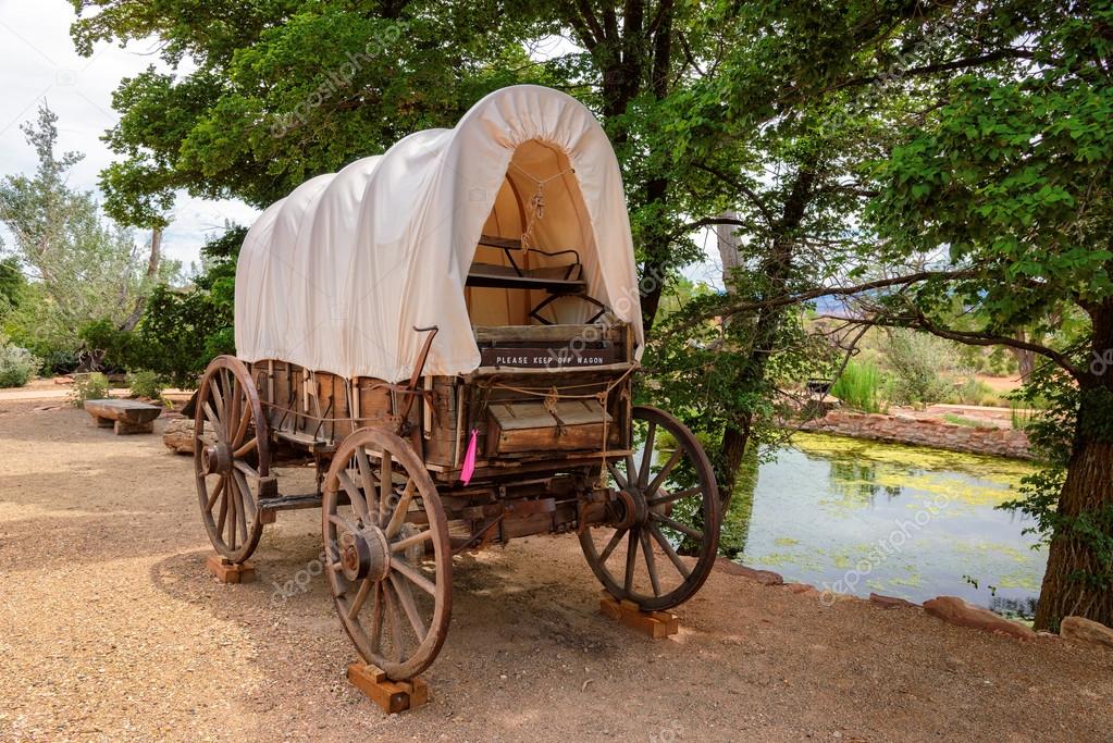 Old covered wagon from the days of the wild west Stock Photo by
