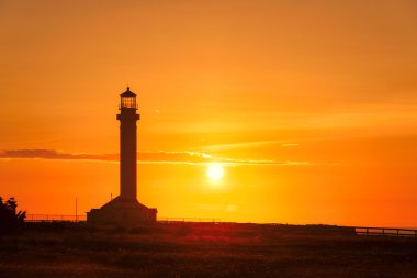 Arena feneri California günbatımında gelin