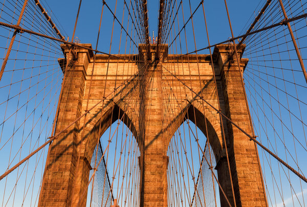 Brooklyn Bridge at sunset in New York City, USA