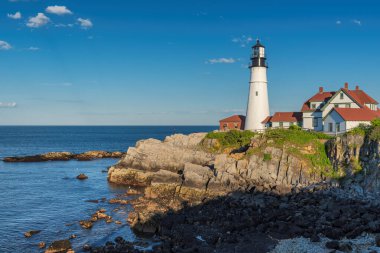 Portland Deniz Feneri gün batımında Cape Elizabeth, New England, Maine, ABD 'de. En ikonik ve en güzel deniz fenerlerinden biri.. 