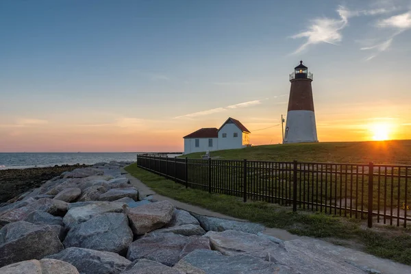 Point Judith lighthouse at sunset, East coast Rhode Island, USA