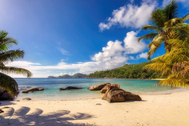 Paradise beach on tropical island Mahe in Seychelles clipart